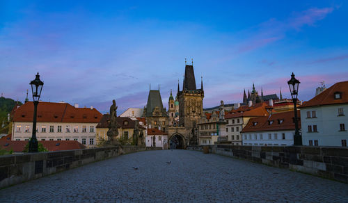 View of buildings in city against sky