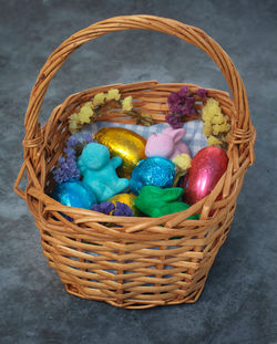 High angle view of multi colored candies in basket