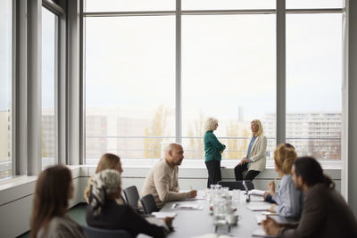 People talking during business meeting