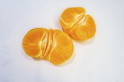 High angle view of orange against white background