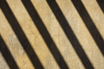 High angle view of shadow on wall