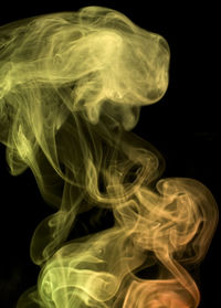 Close-up of smoke against black background