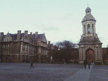 People in front of building