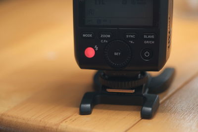 Close-up of camera on table