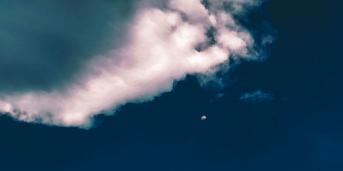 Low angle view of clouds in sky at night