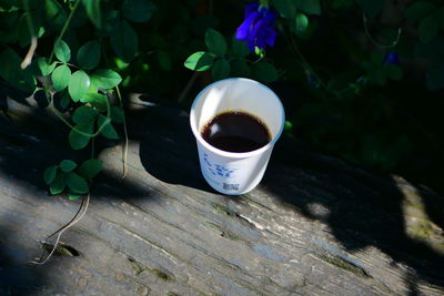 High angle view of coffee cup on table