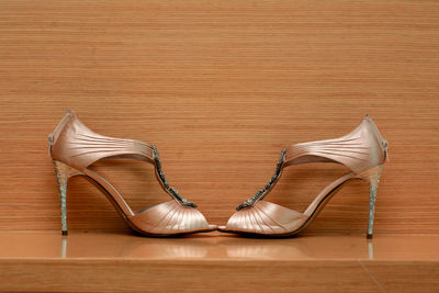 Close-up of shoes on wood