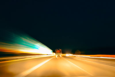 Light trails on road at night