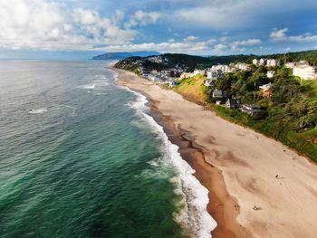 Scenic view of beach against sky