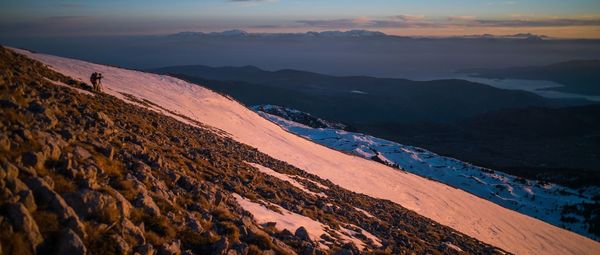 Scenic view of mountains against sky during sunset