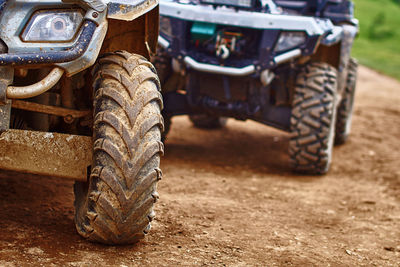 Close-up of vintage car on field