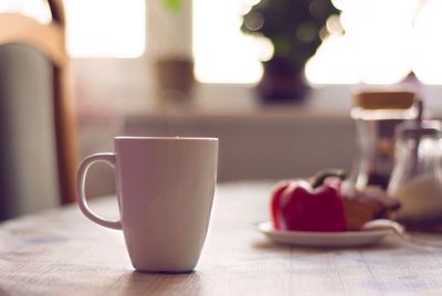 Close-up of tea cup on table