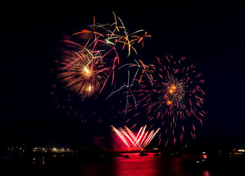Firework display at night