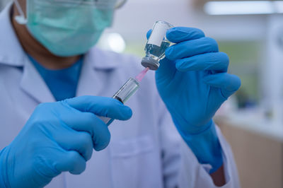 Close-up of human hand holding ring