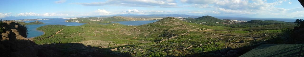 tranquil scene, tranquility, sky, scenics, beauty in nature, mountain, nature, landscape, tree, sea, cloud - sky, panoramic, cloud, idyllic, water, plant, mountain range, growth, non-urban scene, day