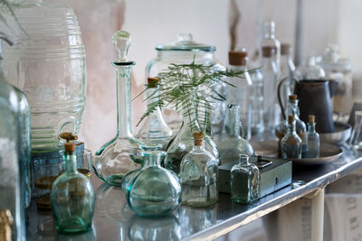 Close-up of glass container on table