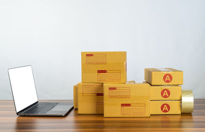 Close-up of toy blocks on table against white background