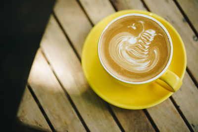 High angle view of cappuccino on table