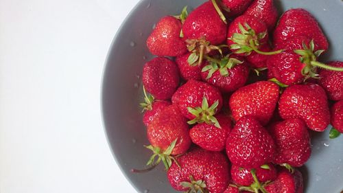 High angle view of strawberries in bowl