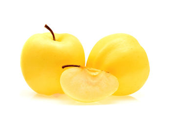 Close-up of apple against white background