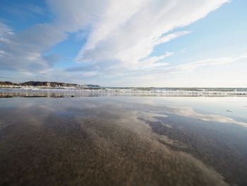 Scenic view of beach against sky