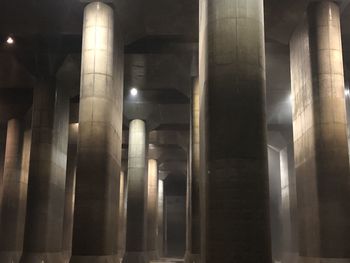 Low angle view of illuminated building at night