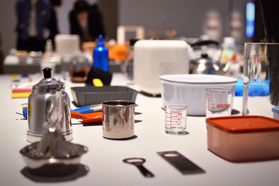 Beakers and containers on table