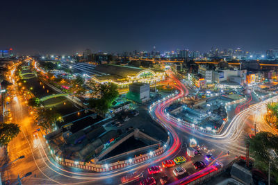 High angle view of illuminated cityscape at night