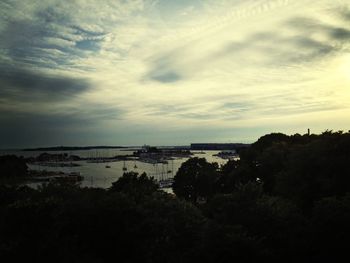 Scenic view of sea against cloudy sky