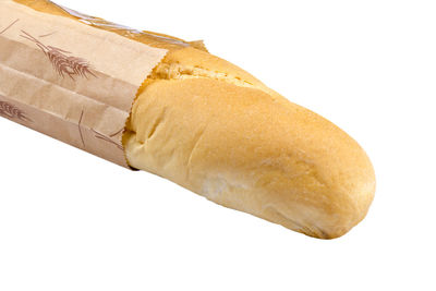 Close-up of bread against white background