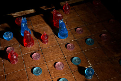 High angle view of chess pieces on table