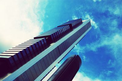 Low angle view of skyscraper against sky