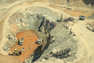 High angle view of vehicles on road along landscape