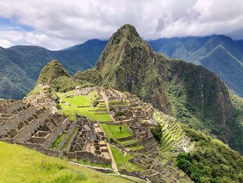 High angle view of ruins of mountain against cloudy sky