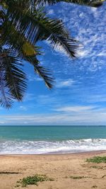 Scenic view of sea against blue sky