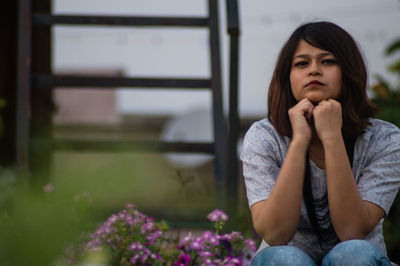 Woman sitting on a table