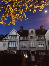 Low angle view of buildings at night