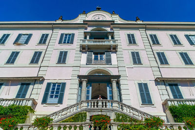 Low angle view of building against blue sky