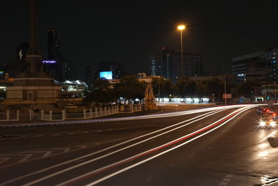 Light trails on city street at night