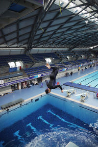 Full length of man swimming in pool