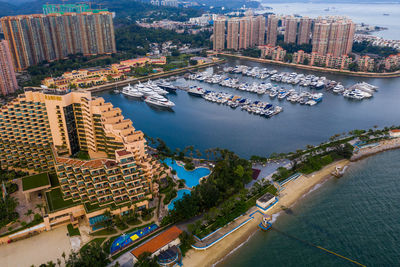 High angle view of river amidst buildings in city