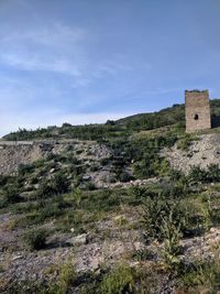 View of old ruin building against sky
