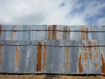 Close-up of dam against sky