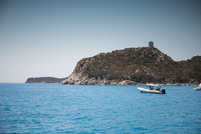 Scenic view of sea against clear sky in porto giunco, villasimius, italy