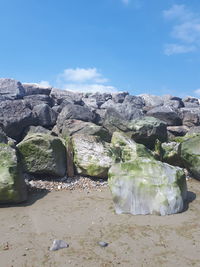 Scenic view of rocks against sky