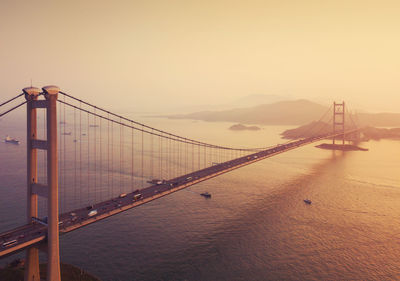 View of suspension bridge over sea