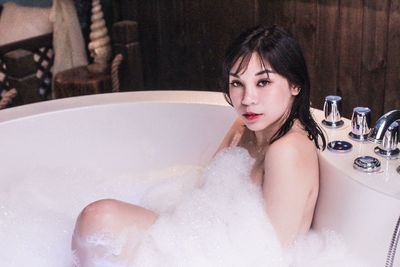 Portrait of woman in bathtub