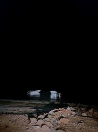 Abandoned building against clear sky at night