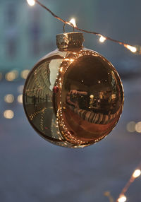 Close-up of illuminated electric lamp