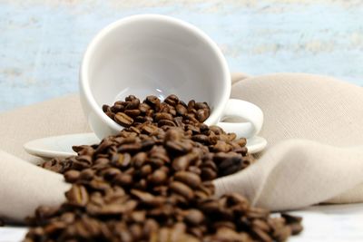 Close-up of coffee beans on table
